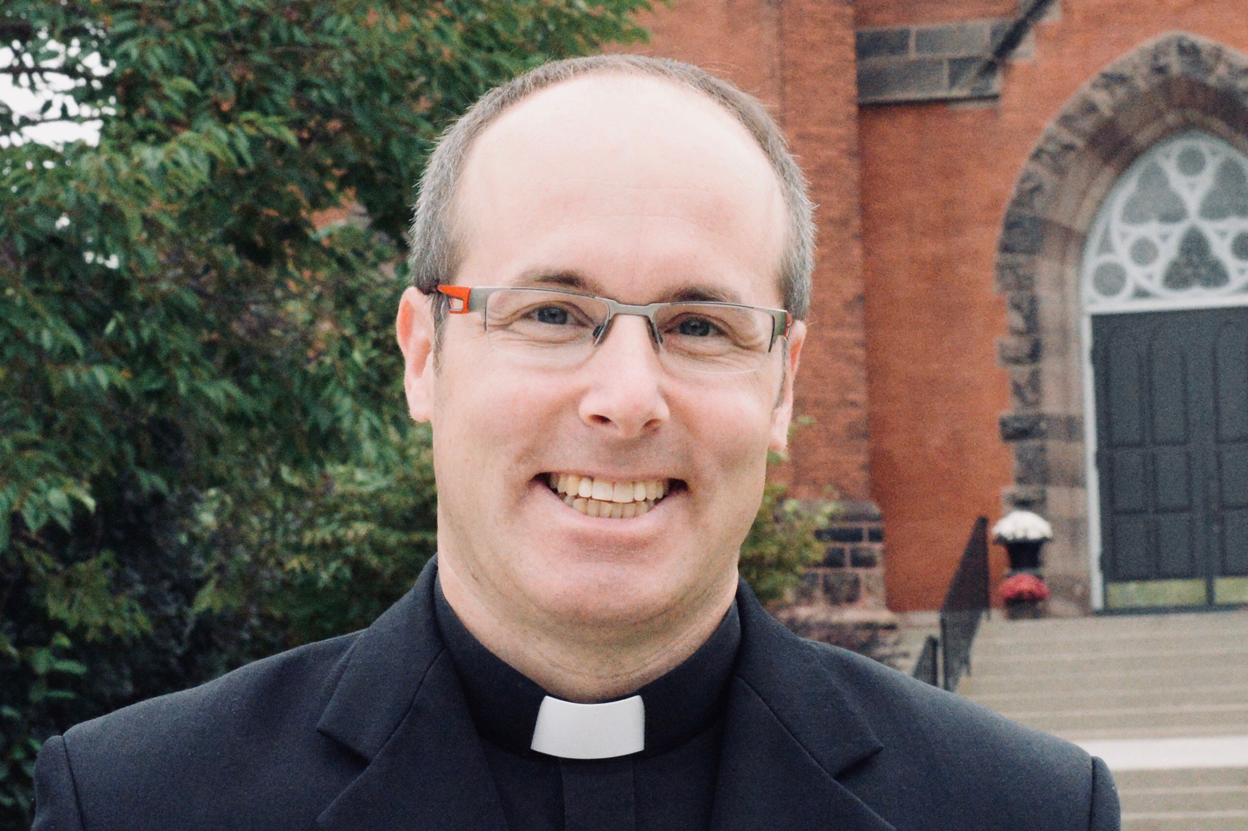 Headshot of Fr. Toby Collins, CR